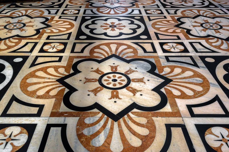 Floor with floral ornament inside Duomo di Milano, cathedral of city. Detail of church interior