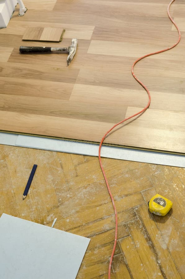 Floor installation stock photo. Image of laminate, occupation - 31807226