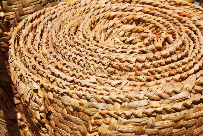 Floor mat made from woven reeds