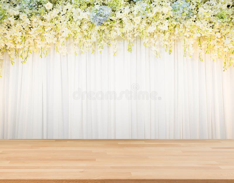 Flora backdrop with wooden floor and white cloth