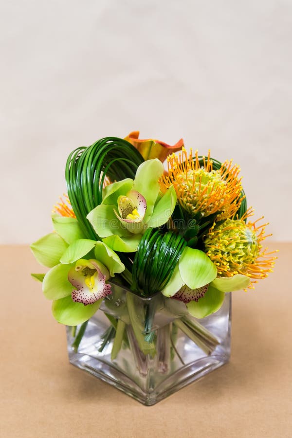 Floral arangement with Calla Lilies, cymbidium, protea and green