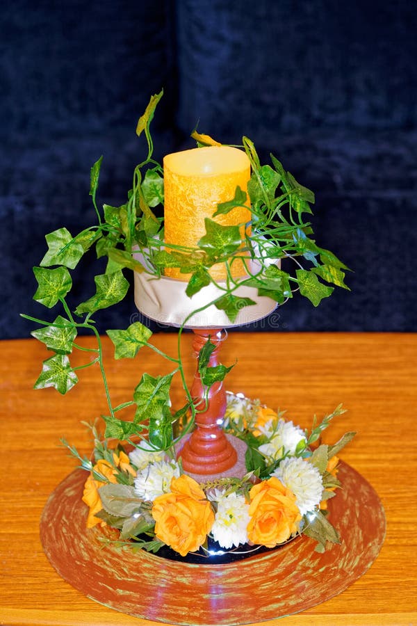 Floral Arrangement and Candle in Indoor Setting Stock Photo Image of