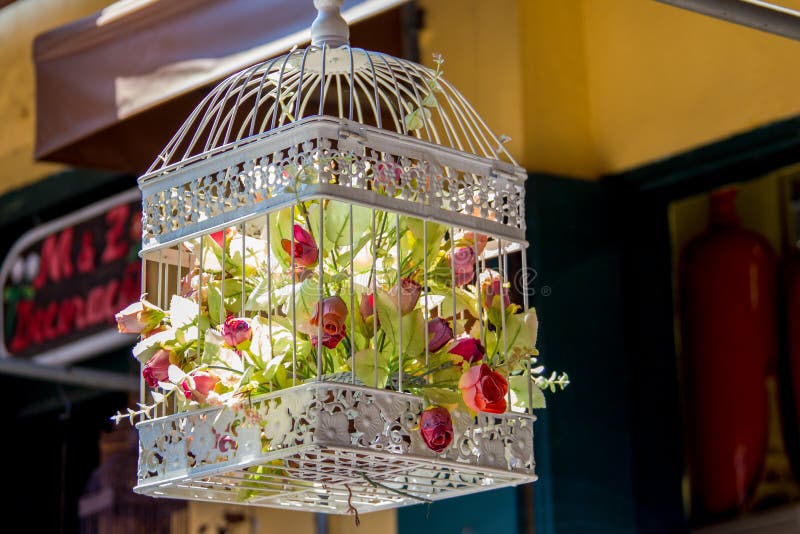 Floral Arrangement of Flowers, Bird Cage with Flowers Stock Photo