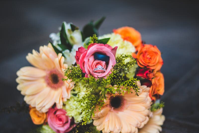 Floral Arrangement with Wedding Rings Stock Image Image of