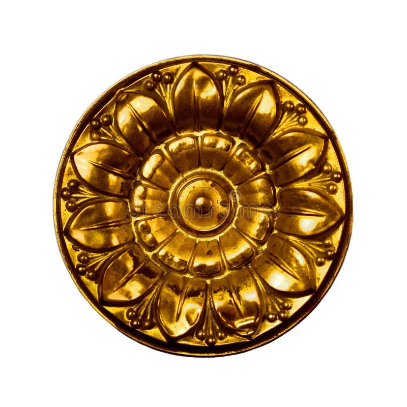 Floral pattern on vintage brass drawer pull stock image