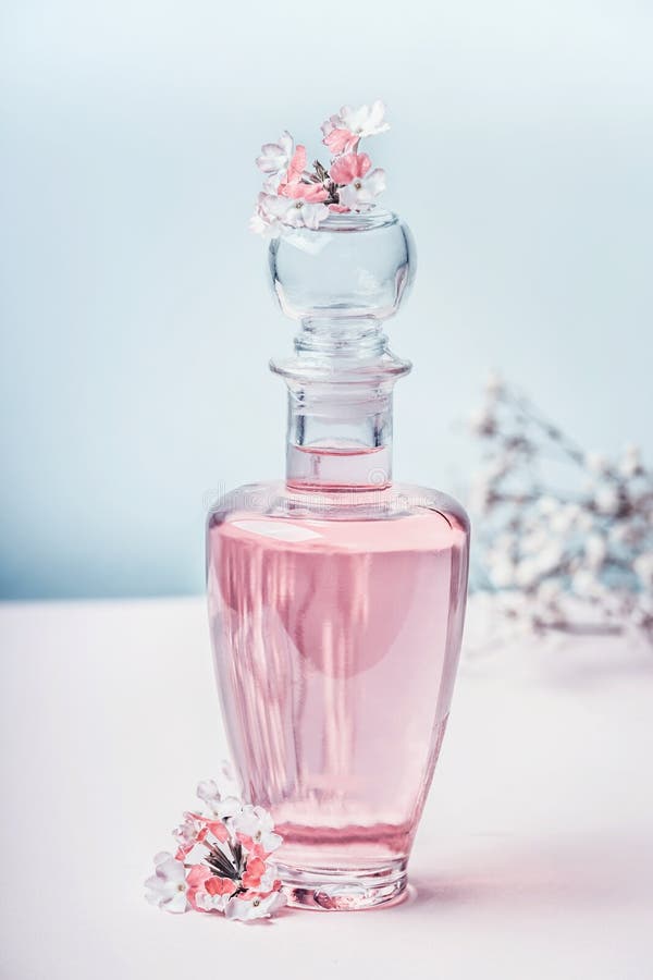 floral-perfume-bottle-flowers-front-view-perfumery-cosmetics-botanical-fragrance-concept-pastel-color-beauty-concept-floral-107237062.jpg