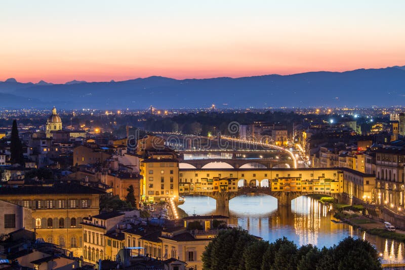 Florence, Arno River and Ponte Vecchio after sunset, Italy stock image
