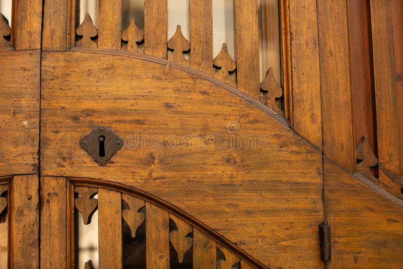 Detail of timber doors within the BadÃ¬a Fiorentina abbey and church