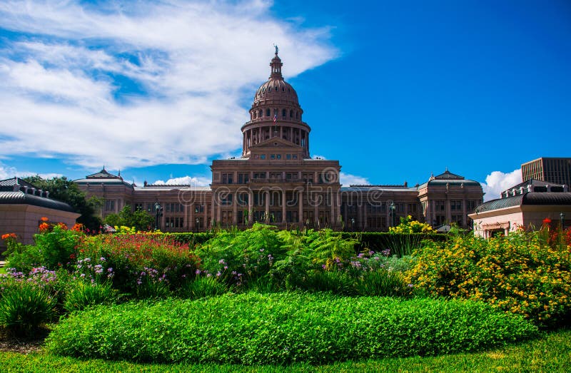Flores coloridas de Texas State Capital Building Austin