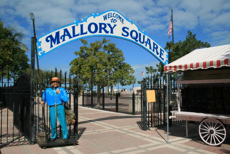 The entrance to the famed Mallory Square in Key West, Florida where residents and visitors gather each evening to watch spectacular sunsets. The entrance to the famed Mallory Square in Key West, Florida where residents and visitors gather each evening to watch spectacular sunsets.