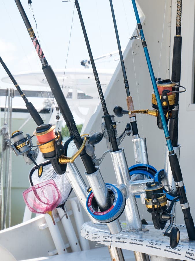 https://thumbs.dreamstime.com/b/florida-usa-august-fishing-poles-boat-picture-rod-holders-back-161353767.jpg