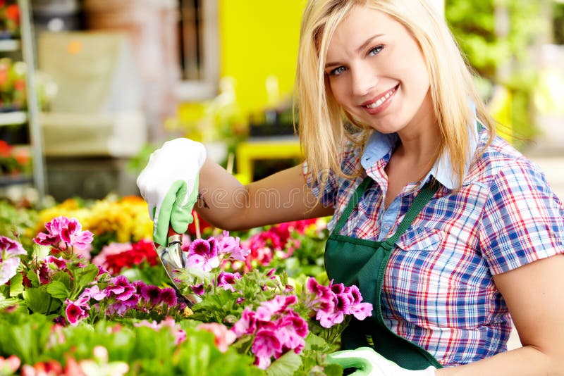 Florists woman working with flowers stock photo Florists woman working with flowers stock photo