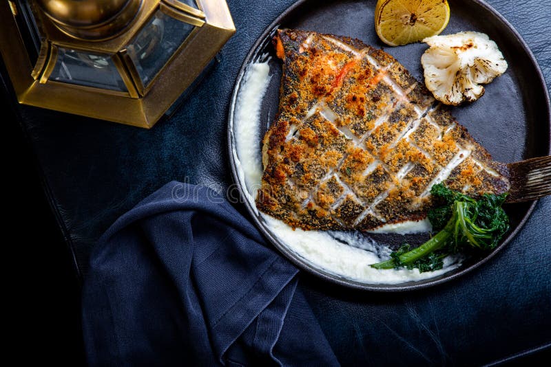 Flounder Fillet Roasted in a Skillet with Herbs and Lemon Stock Photo Image of halibut, lemon