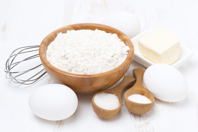 Flour, salt, sugar, butter and eggs for baking pancakes, close-up. Flour, salt, sugar, butter and eggs for baking pancakes, close-up