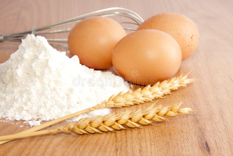 Flour, wheat and eggs stock image. Image of industry 24690103
