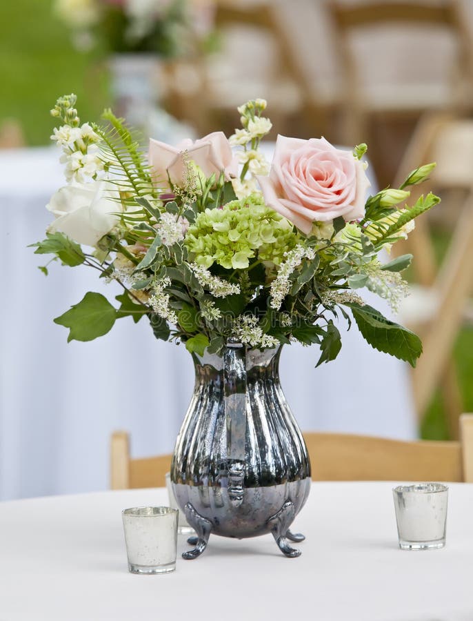 Flower arrangement in pitcher