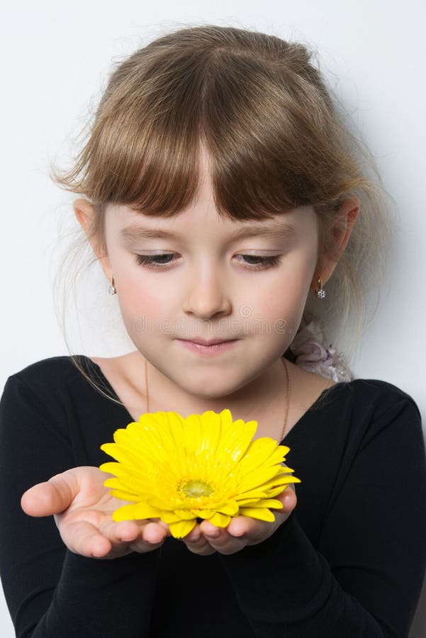 Flower in the Hands of a Young Girl Stock Photo Image of flower, hands 82950016
