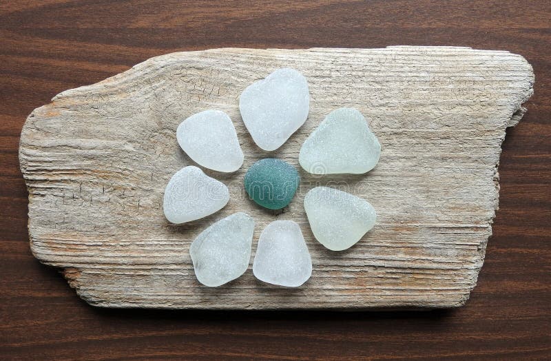 Flower picture created using sea glass and sea wood. Flower picture created using sea glass and sea wood