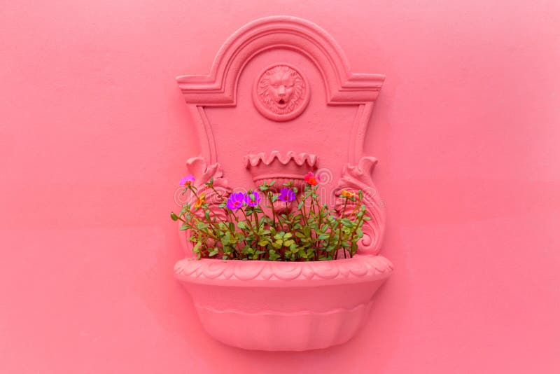 Flower pot on the wall stock image. Image of pink, outdoor 44383015