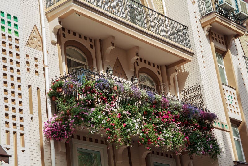 Flowers on the balcony of a luxury house in a classic style stock image Flowers on the balcony of a luxury house in a classic style stock image