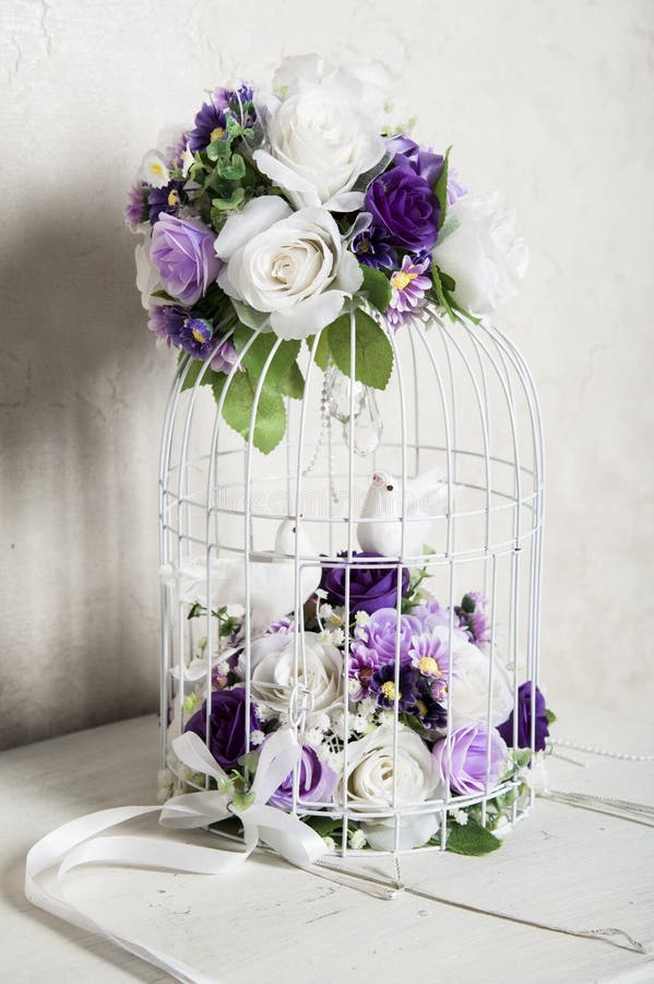 Flowers and bird cages