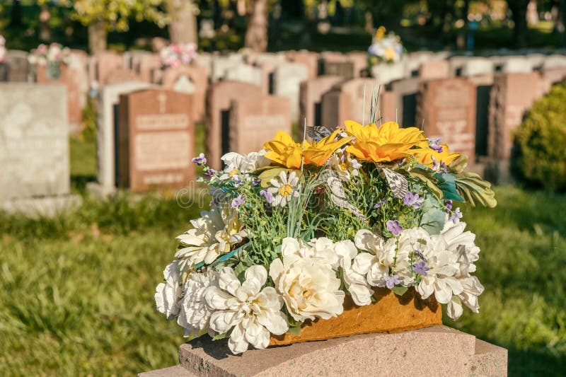 Flowers in Cemetery stock photo. Image of headstone, light 29656040