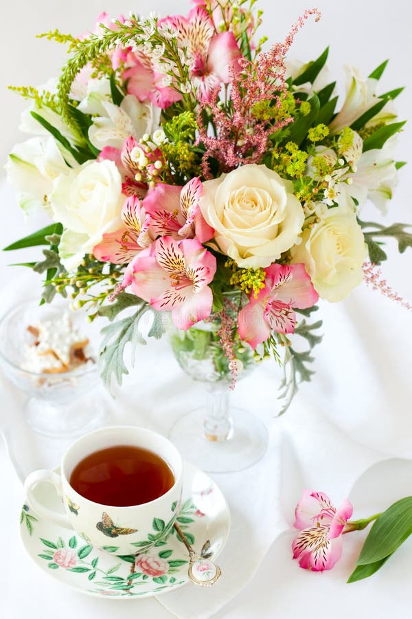 Flowers and cup of tea stock photo. Image of decoration 22288728