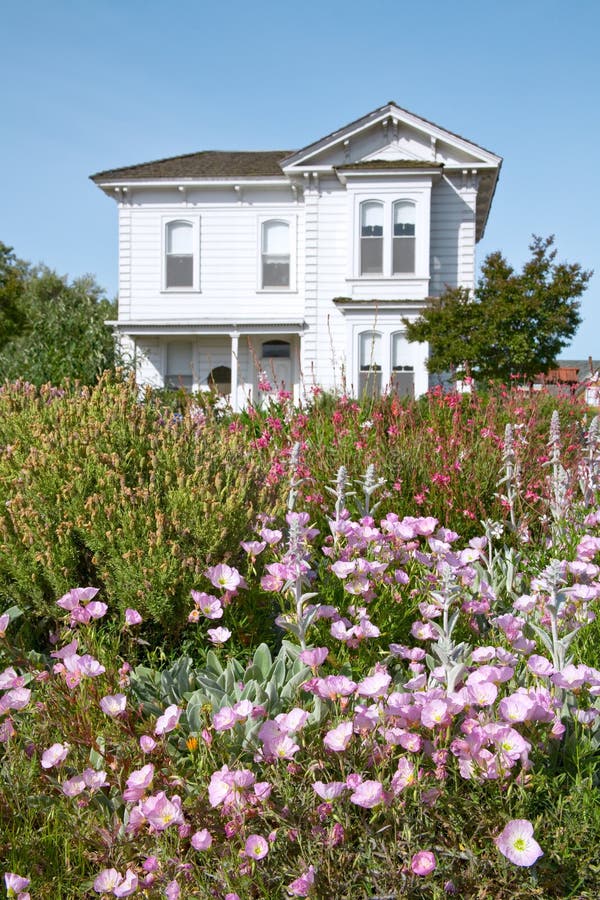 Flowers in Front of Old Victorian Farmhouse Stock Image Image of