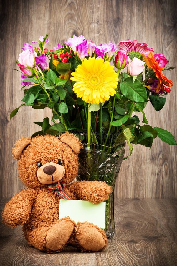 Flowers and a teddy bear stock image. Image of love, celebration 92933643