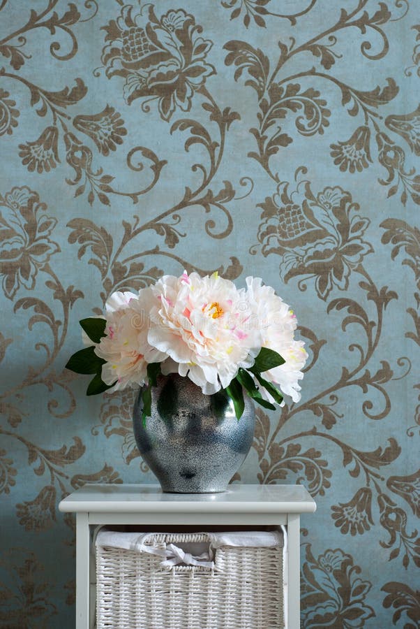 Flowers in a Vase on the Bedside Table. in the Room Stock Photo Image