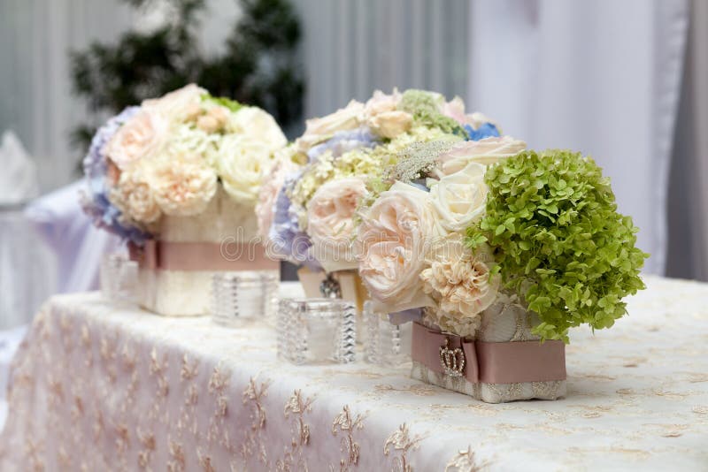 Flowers in the vase. Elegance table set up for wedding