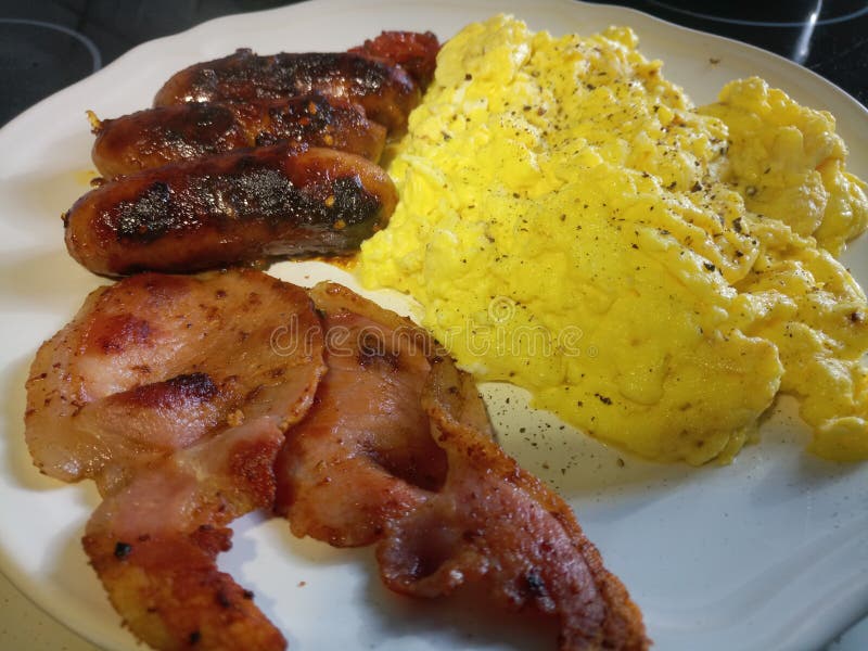 Scrambled Egg, Bacon and Pork Sausages Stock Photo Image of breakfast, bacon 103510882