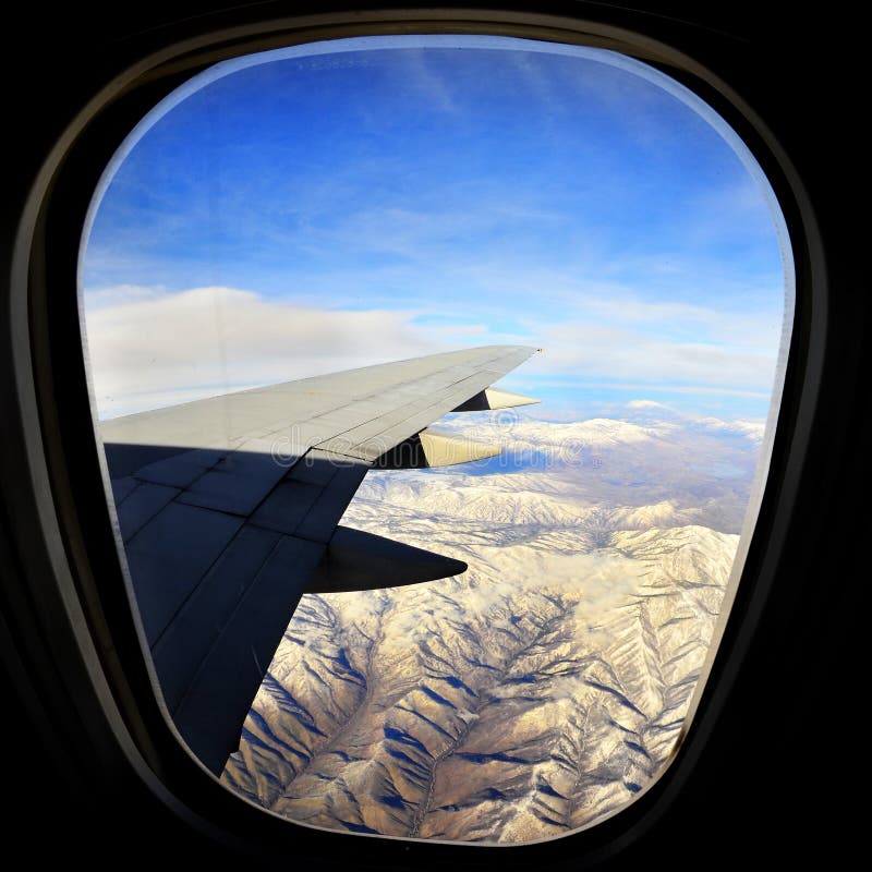 FlugzeugFenster für Reise stockfoto. Bild von strahl