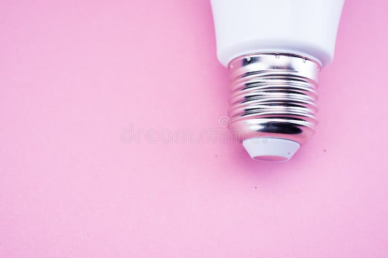 Fluorescent Light Bulb on the Pink Surface Stock Image Image of