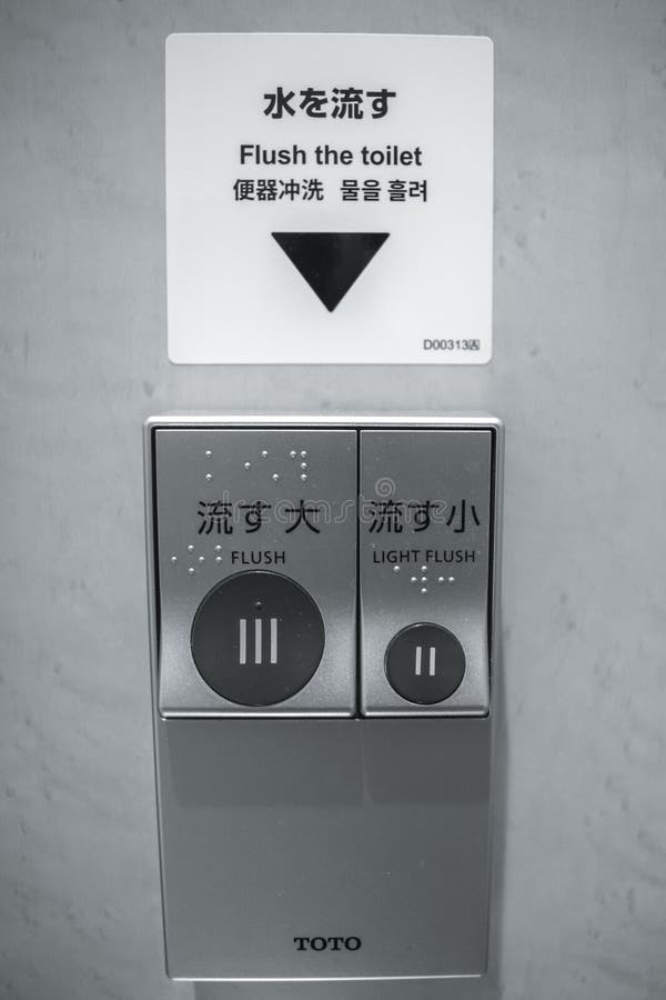 Flush Sings on Japanese Toilets in a Restaurant in Tokyo Editorial