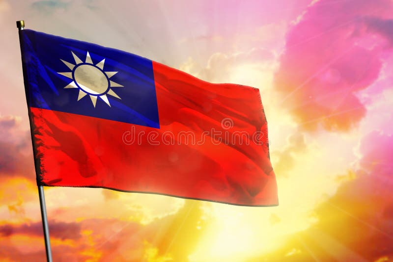 Fluttering Taiwan Province of China flag on beautiful colorful sunset or sunrise background. Success concept