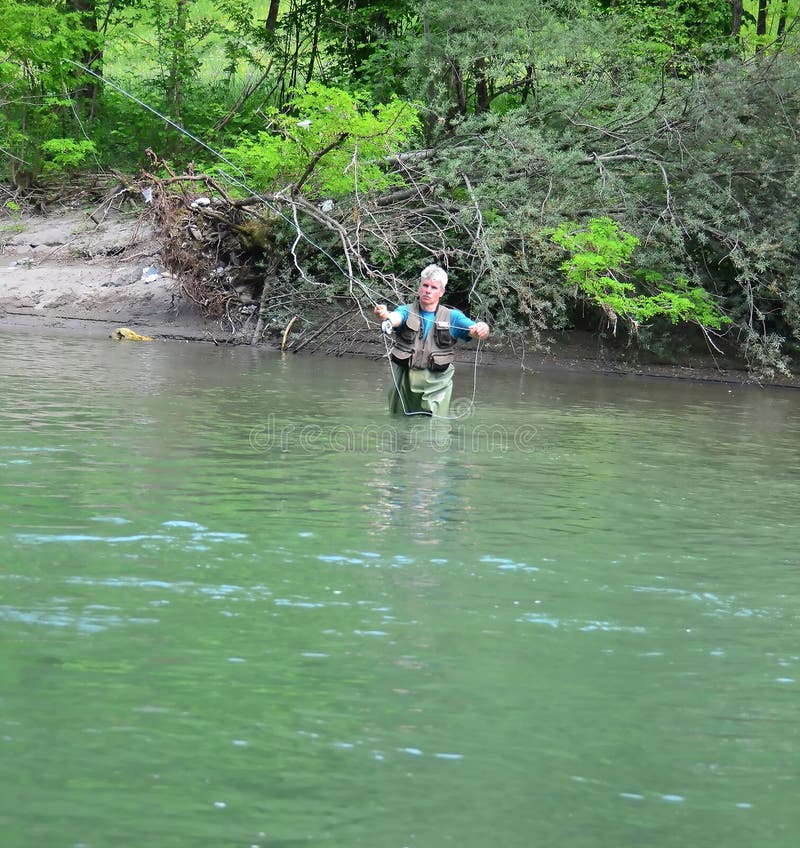 Fly fishing stock image. Image of blue, wading, clear 22199553