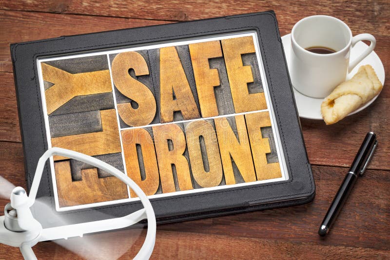 Fly safe drone word abstract on digital tablet royalty free stock image Fly safe drone word abstract on digital tablet royalty free stock image