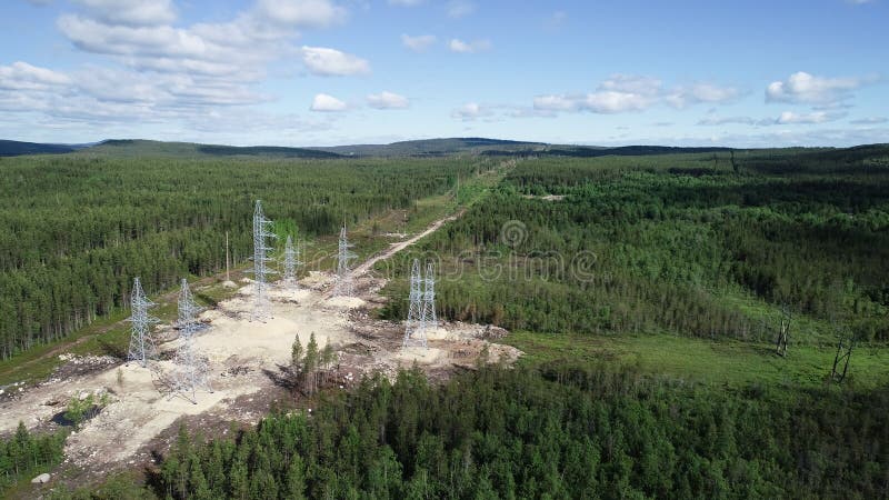 Flyg- sikt för elektricitetspyloner fotografering för bildbyråer