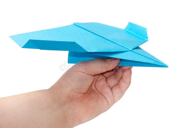 Flygplan för origami för ungeinnehavpapper royaltyfri foto Flygplan för origami för ungeinnehavpapper royaltyfri foto