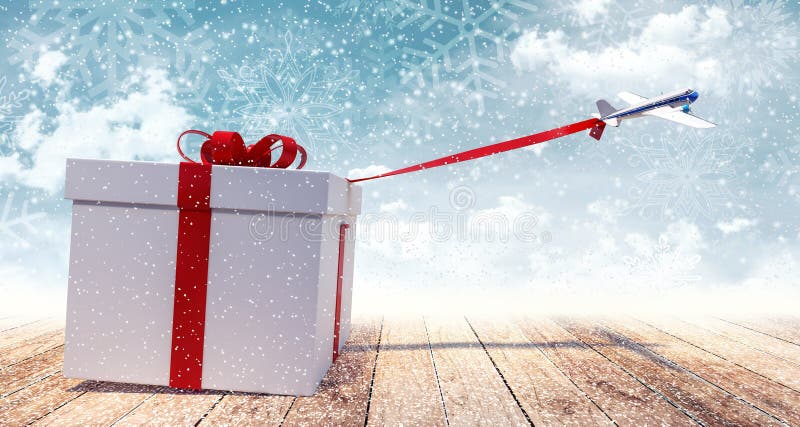 Flygplanleksak som drar enorm vit julklapp royaltyfri foto