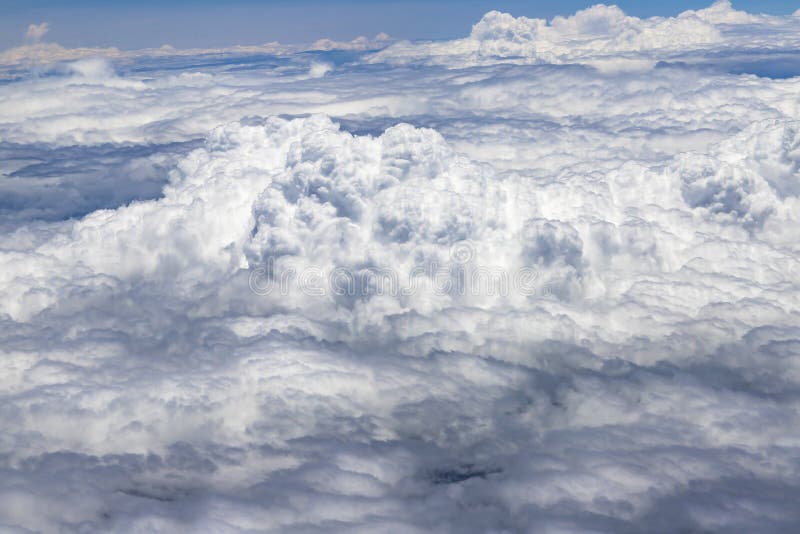 Flying above a dense layer of white clouds. Great and beautiful clouds. royalty free stock photography Flying above a dense layer of white clouds. Great and beautiful clouds. royalty free stock photography