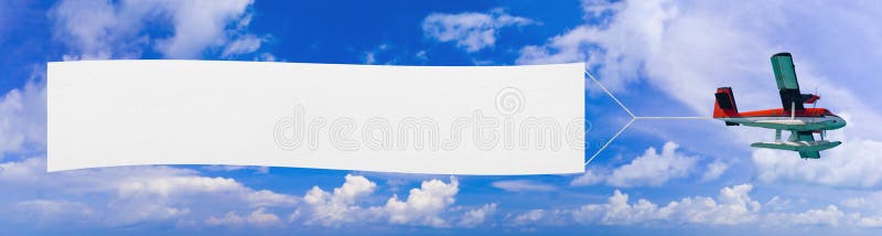 Flying airplane and banner