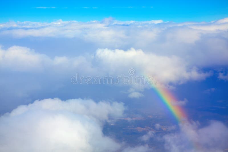 Flying through the Clouds and Rainbow Stock Photo Image of abstract