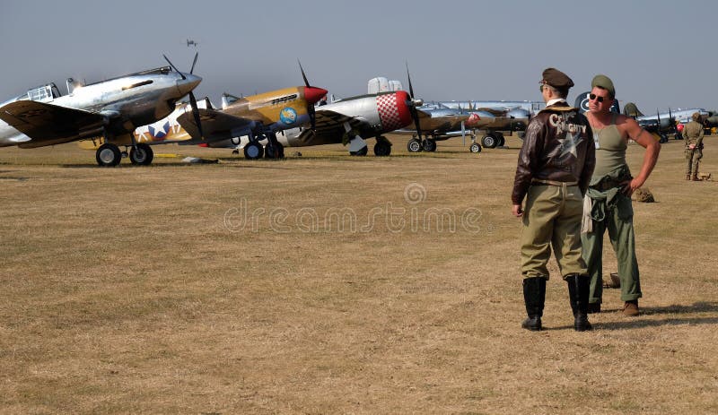 Two re-enactors dressed as pilot and ground crew. royalty free stock images Two re-enactors dressed as pilot and ground crew. royalty free stock images