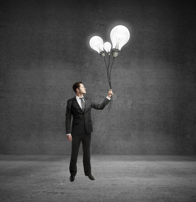 Flying light bulb stock image. Image of person, closeup 34530353