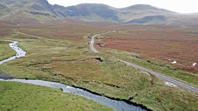 Flying over the River Lealt and Single track at Loch Cuithir and Sgurr a Mhadaidh Ruadh - Hill of the Red Fox, Isle of