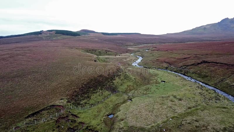 Flying over the River Lealt and Single track at Loch Cuithir and Sgurr a Mhadaidh Ruadh - Hill of the Red Fox, Isle of