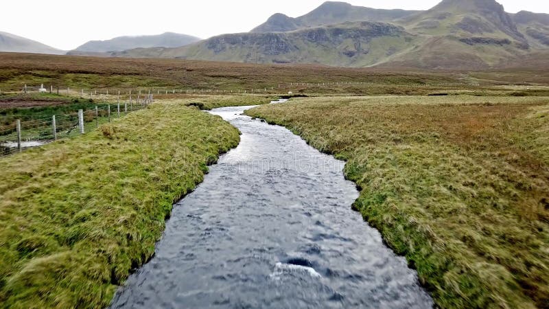 Flying over the River Lealt and Single track at Loch Cuithir and Sgurr a Mhadaidh Ruadh - Hill of the Red Fox, Isle of