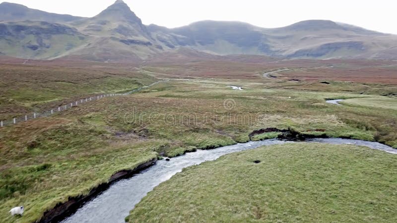 Flying over the River Lealt and Single track at Loch Cuithir and Sgurr a Mhadaidh Ruadh - Hill of the Red Fox, Isle of